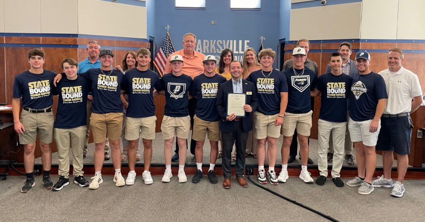 The Providence High School Baseball Team poses with the Clarksville Town Council.