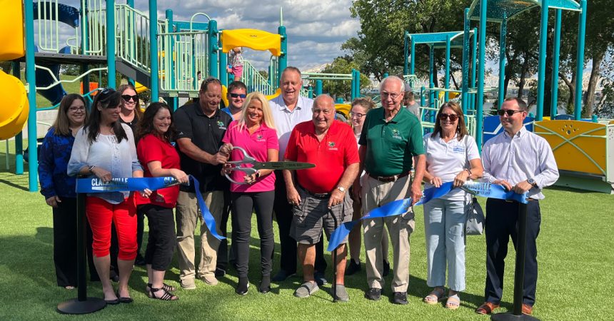 Officials cut the ribbon opening the Ashland Park Playground